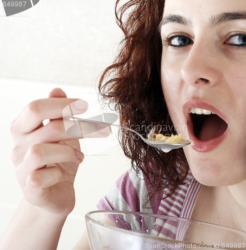 Image of Young people eating milk with cereals