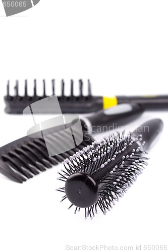 Image of three hairbrushes
