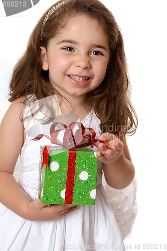 Image of Angelic girl holding a gift