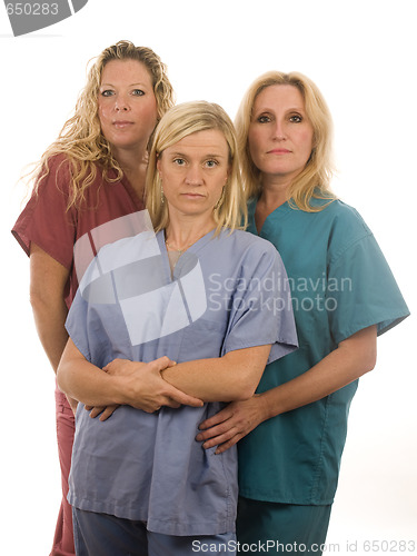 Image of three nurses in medical scrubs clothes