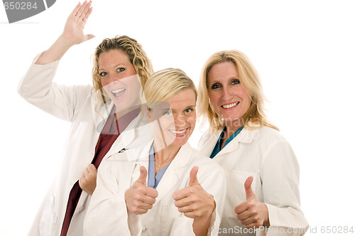 Image of three nurses medical females with serious expression