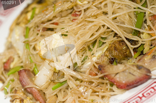 Image of chinese thin rice noodles flat with sliced roast pork