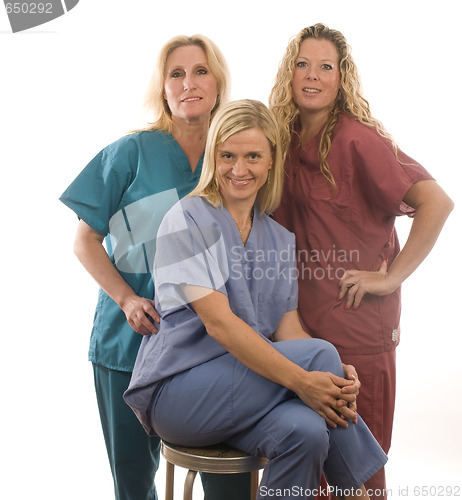 Image of three nurses in medical scrubs clothes