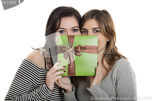 Image of Young WomenÕs holding a present
