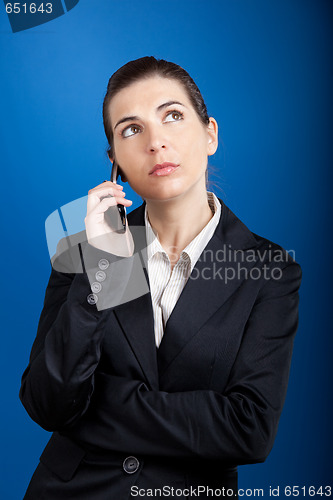 Image of Businesswoman calling at phone