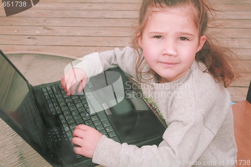 Image of Young girl on laptop