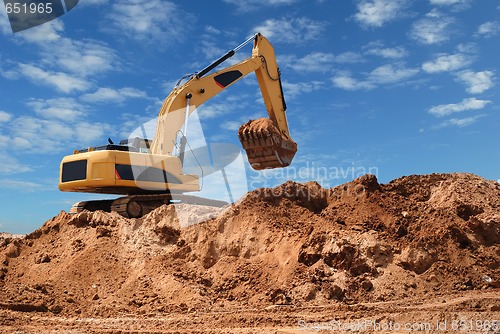 Image of Excavator bulldozer in sandpit