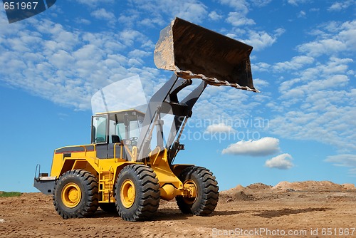 Image of wheel loader bulldozer in sandpit