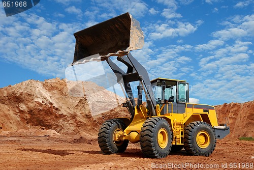 Image of wheel loader bulldozer in sandpit