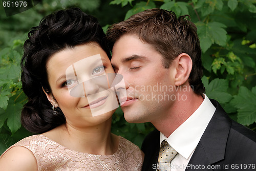 Image of Close-up photo of happy young wedding couple