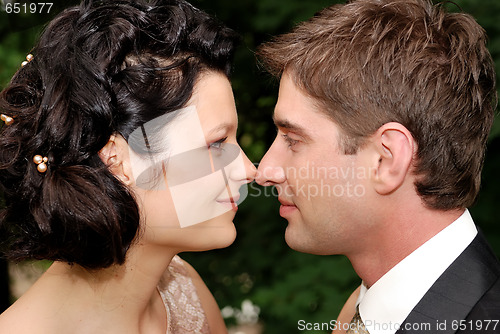 Image of Close-up photo of young wedding couple