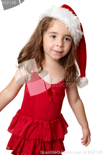 Image of Child wearing a red Santa hat