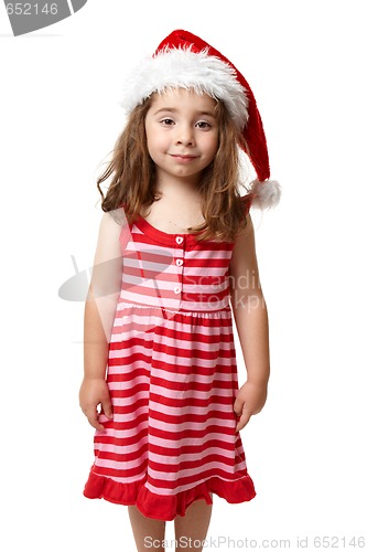 Image of Girl wearing a santa hat at Christmas time