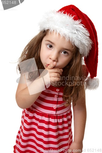 Image of Santa girl hushing or gesturing for quiet