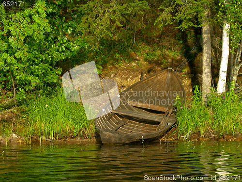 Image of Old row boat on the shore