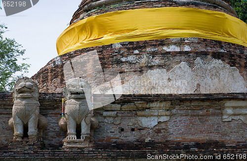 Image of Stone lions at a stupa in Ayuttaya, Thailand