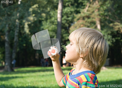 Image of Boy with soap bubbles