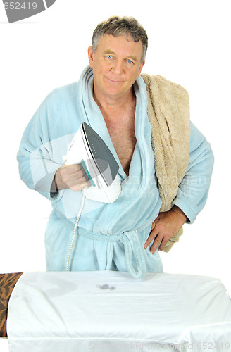 Image of Grumpy Man Ironing