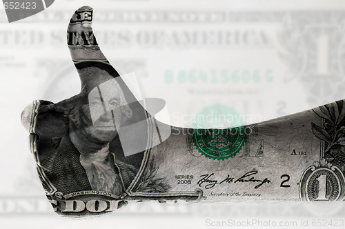 Image of thumb up us dollar