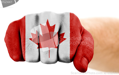 Image of fist with canadian flag 