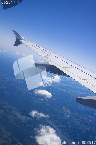 Image of A view of clouds from an airplane window