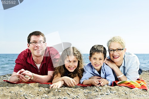 Image of Happy family at beach