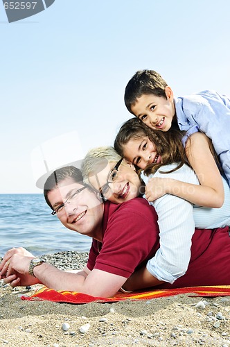 Image of Happy family at beach