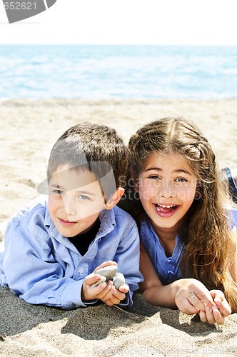 Image of Brother and sister at beach