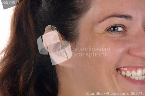 Image of Beautiful young woman with hearing aid