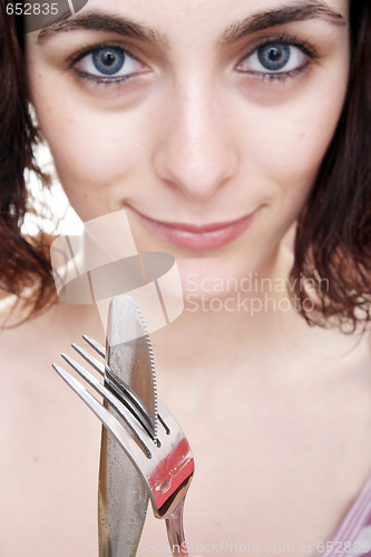 Image of Woman waiting for dinner