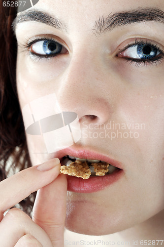 Image of Young people eating milk with cereals
