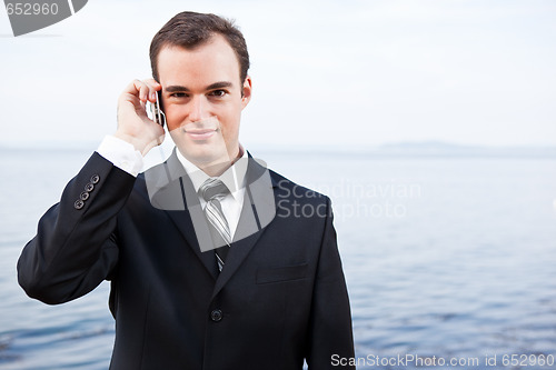 Image of Caucasian businessman on the phone