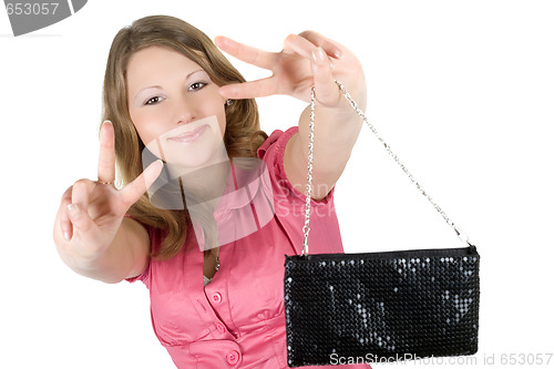 Image of Beautiful playful young woman with a handbag. Isolated 