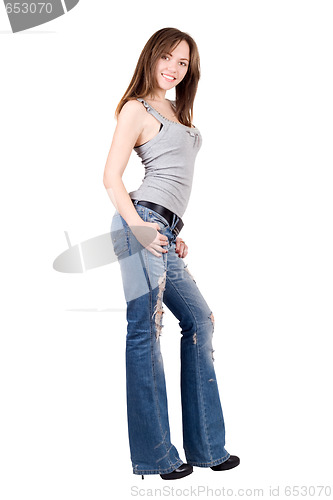 Image of Pretty young woman in a blue jeans. Isolated