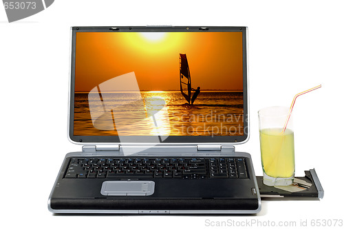 Image of Laptop and cocktail. Isolated on white background