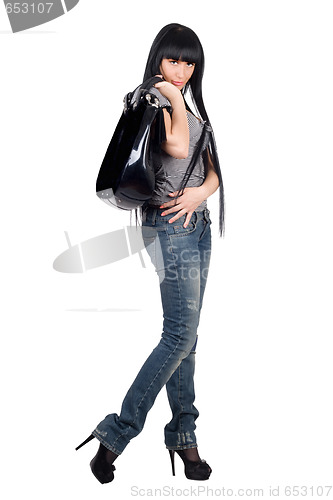 Image of Pretty girl with a handbag. Isolated on white