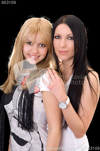 Image of Portrait of the young blonde and brunette. Isolated