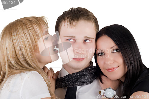 Image of Portrait of the young man and two young women. Isolated