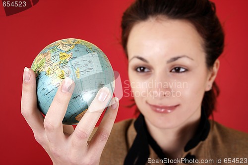 Image of Globe in a girl's hands