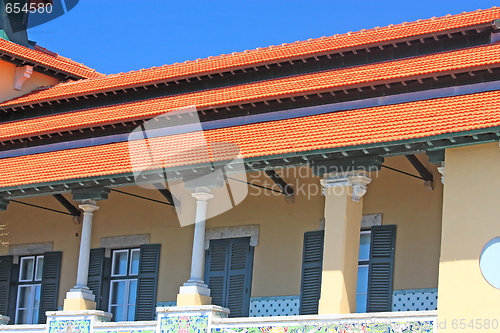 Image of house  on sunny day with blue sky