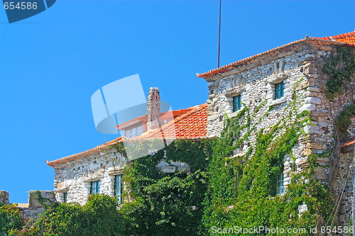 Image of Facade of an old stone house