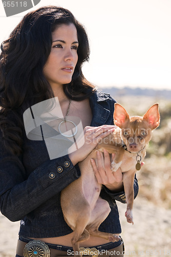 Image of Hispanic woman and dog