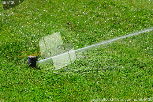 Image of  Irrigation system throwing water drops away