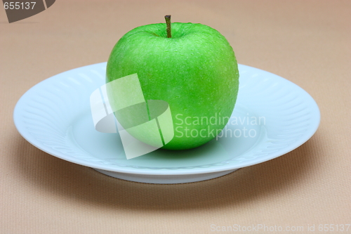Image of Green apple on white plate