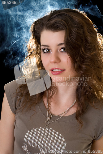 Image of Pretty young womanl. Isolated on black background