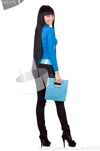 Image of Pretty girl with a blue handbag. Isolated