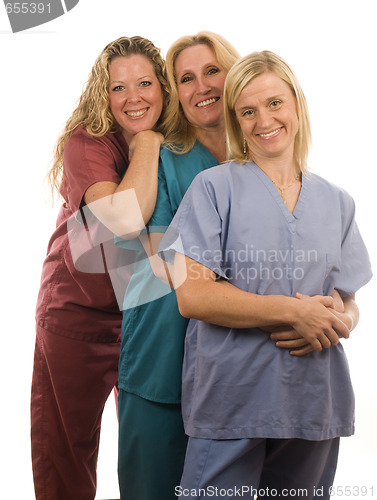 Image of three nurses in medical scrubs clothes