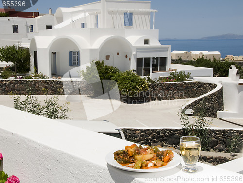 Image of greek island specialty food grilled vegetables with white wine v