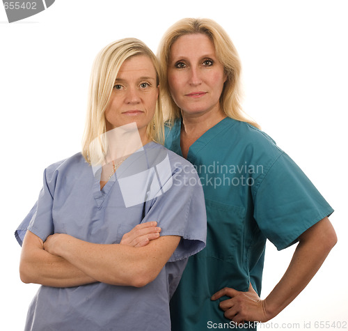 Image of  team of two nurses in medical scrubs clothes