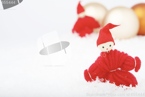 Image of Christmas elves and baubles.